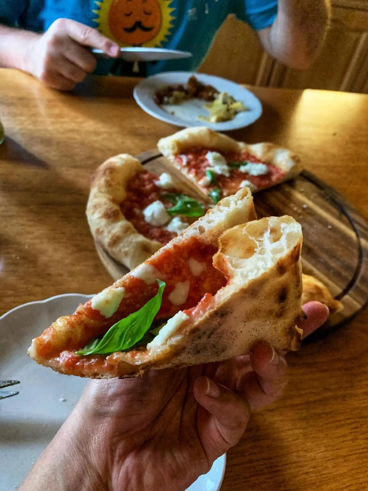 Slice of Neapolitan pizza made in the household oven